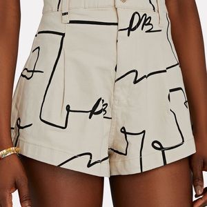 Printed denim trumpet flare shorts